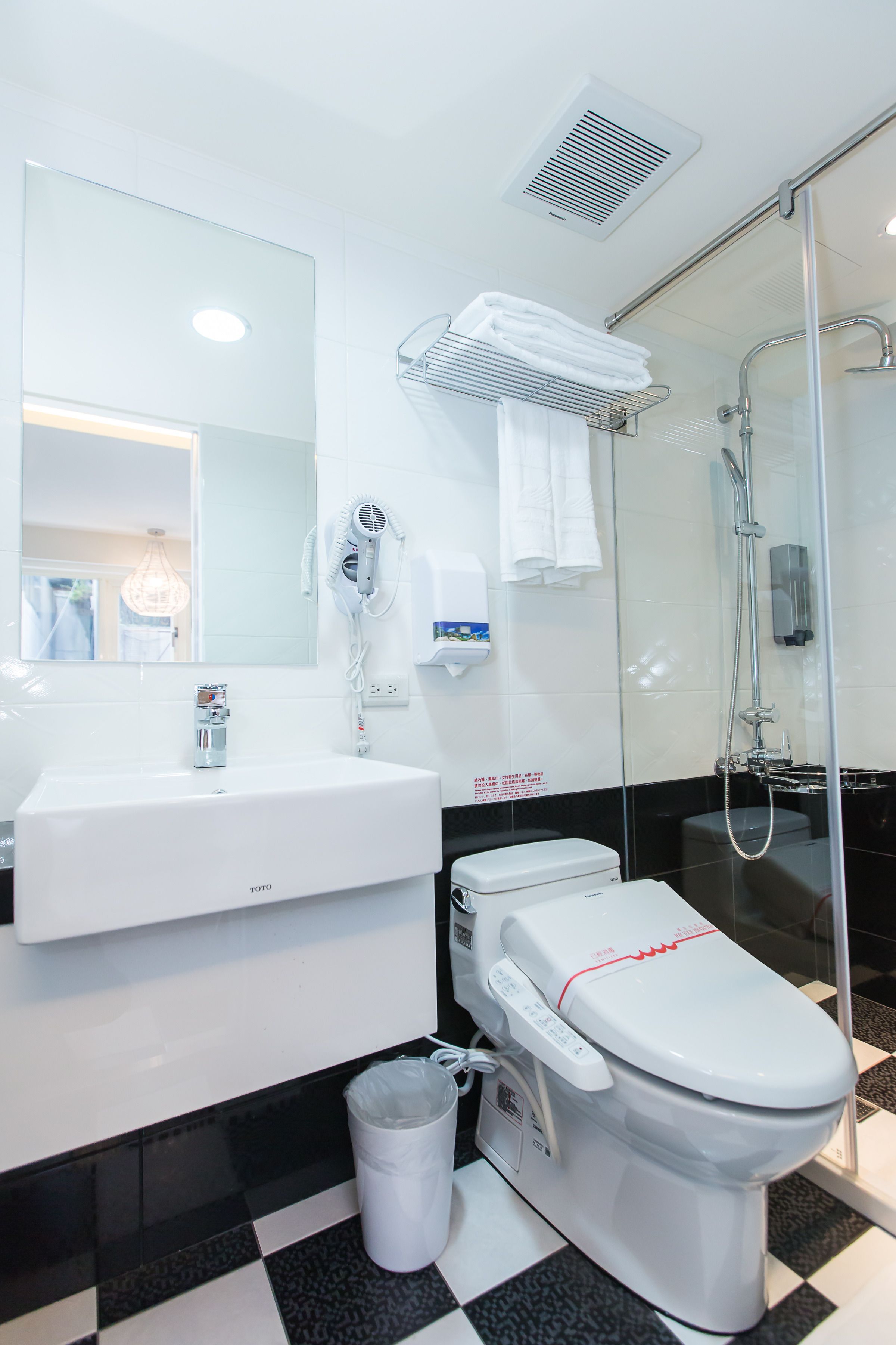 luxury room, no windows | bathroom | shower, free toiletries, hair dryer, towels