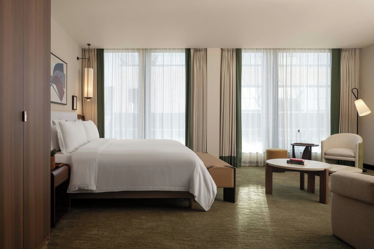 Suite, 1 King Bed, City View | Minibar, in-room safe, desk, laptop workspace