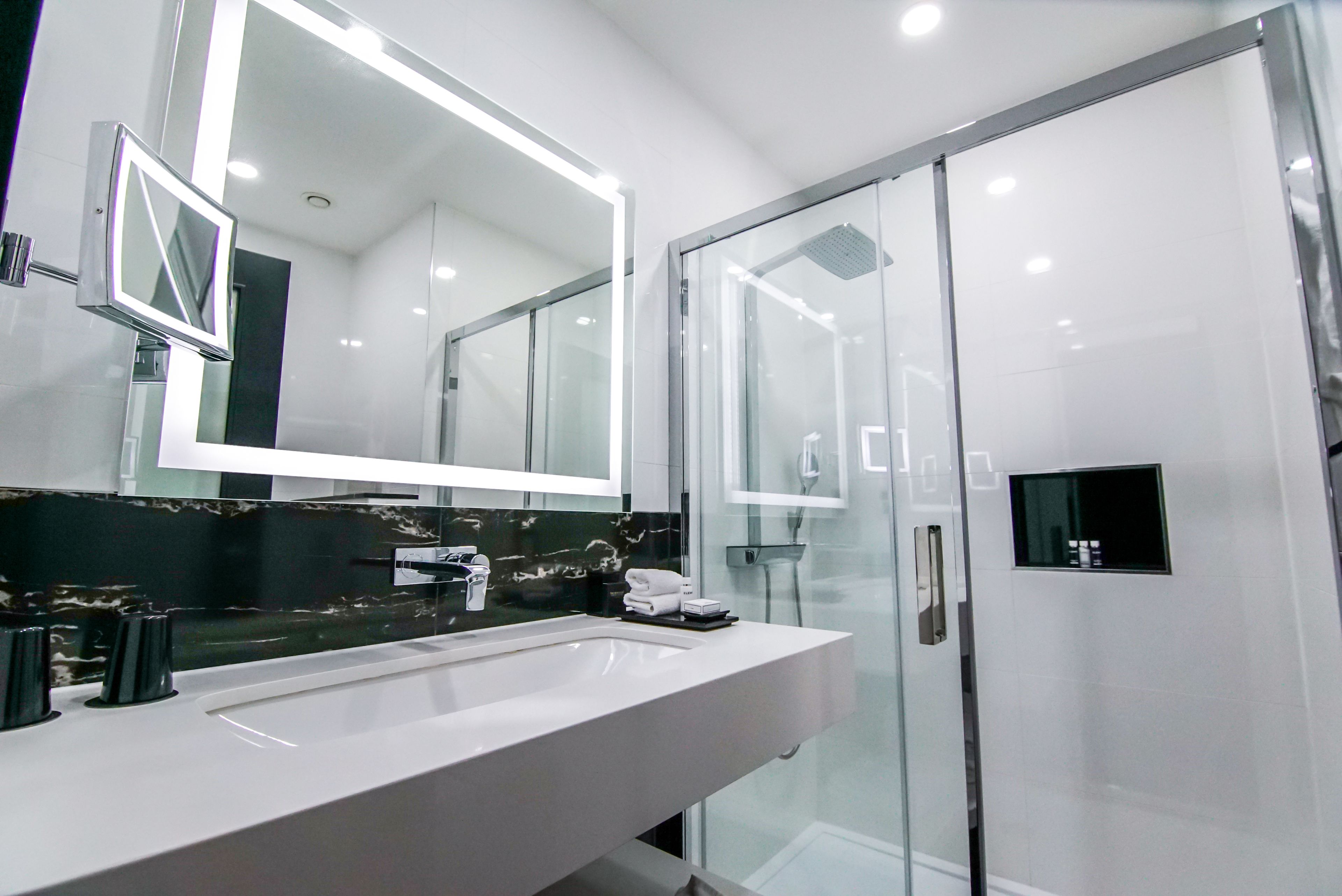 club twin room | bathroom | designer toiletries, hair dryer, slippers, towels