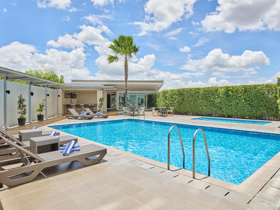 Outdoor pool, pool umbrellas, pool loungers