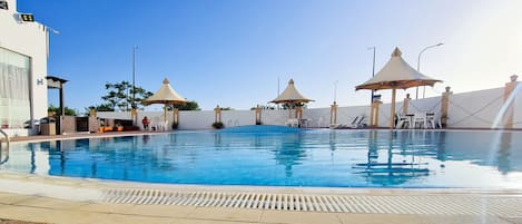 Outdoor pool, sun loungers