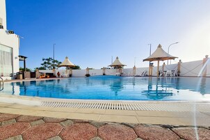 Outdoor pool, sun loungers