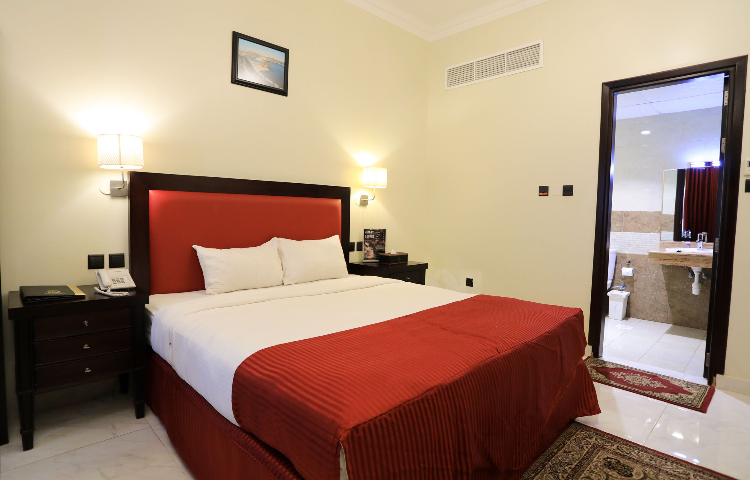 Premium bedding, desk, laptop workspace, iron/ironing board (on request)