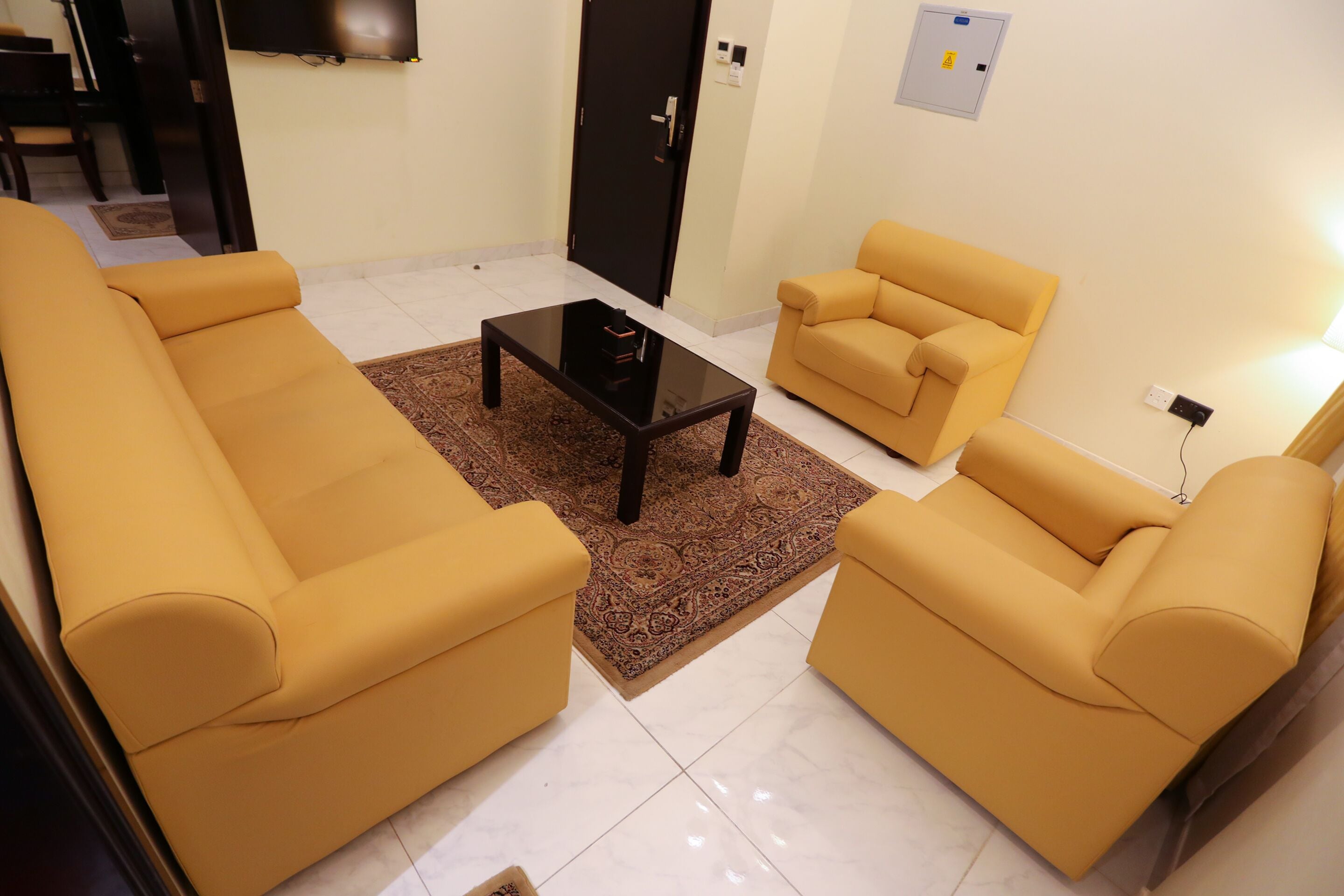 two bedroom suite | living room | flat-screen tv