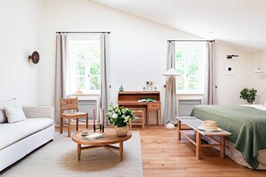 Habitación superior | Ropa de cama de alta calidad y artículos del minibar gratis