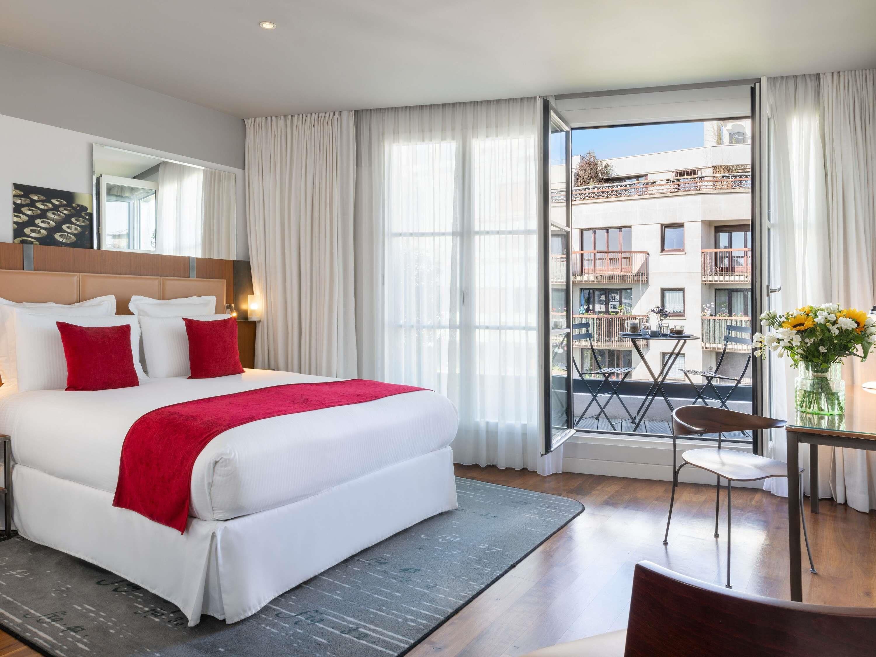 Camera Deluxe, 1 letto king, balcone | Biancheria da letto di alta qualità, minibar, una cassaforte in camera