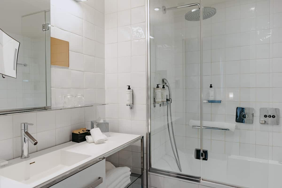 Rainfall showerhead, designer toiletries, hair dryer, bathrobes
