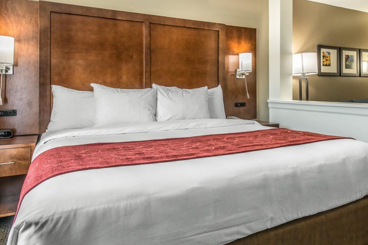 desk, laptop workspace, blackout curtains, iron/ironing board