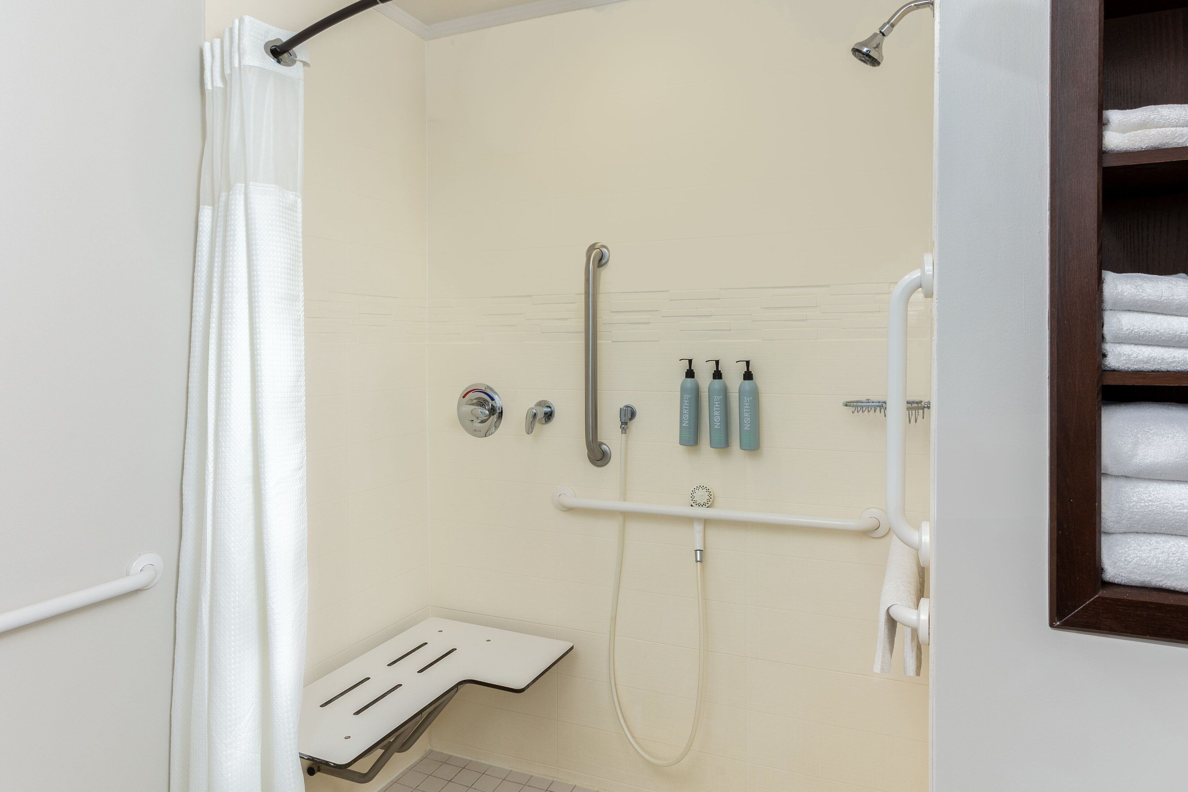 shower, free toiletries, hair dryer, towels