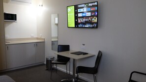 Desk, laptop workspace, blackout curtains, soundproofing