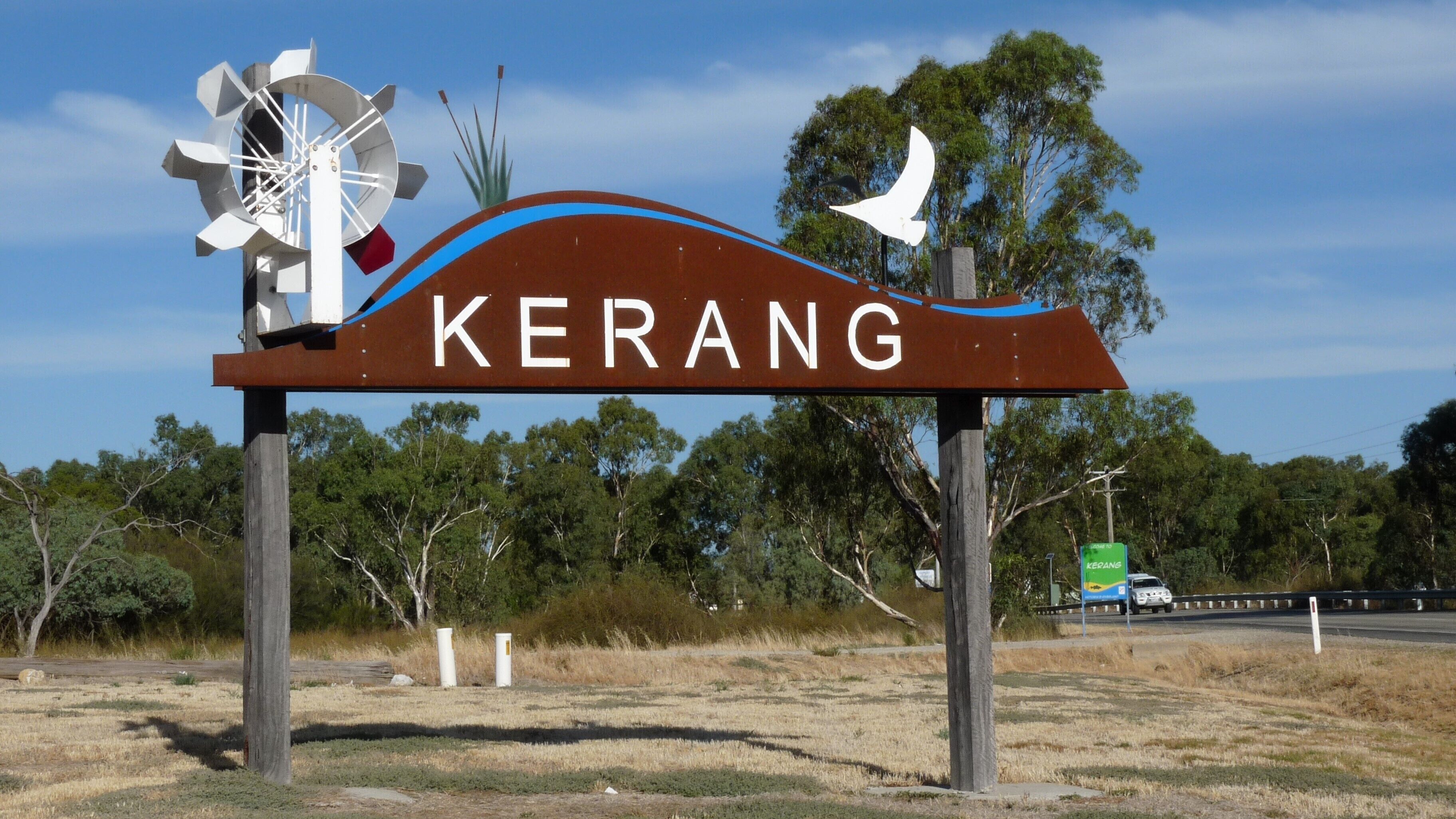 A sign with the word 'KERANG' and a windmill.