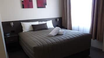 Desk, laptop workspace, blackout curtains, soundproofing