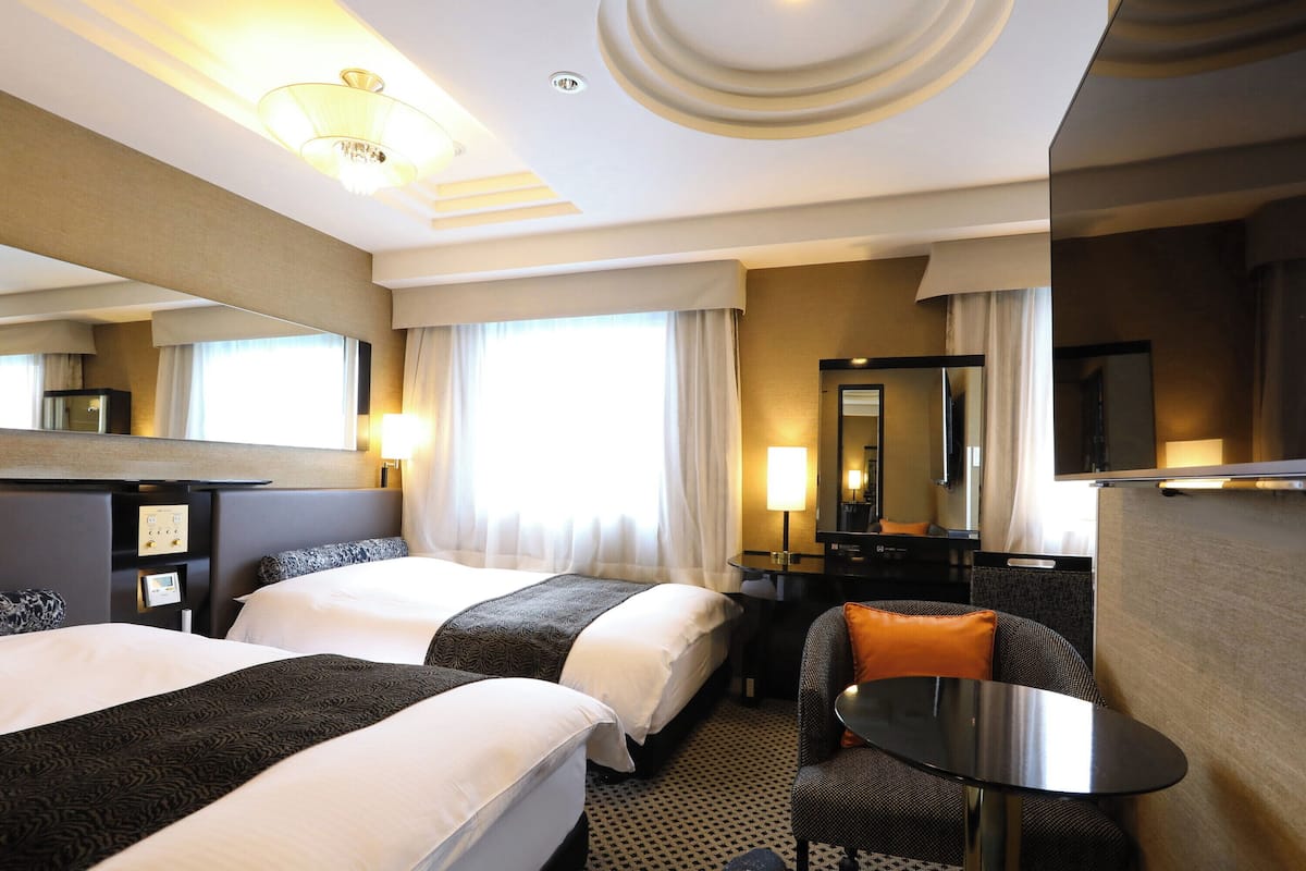 Deluxe Twin Room, Non Smoking | 1 bedroom, desk, blackout drapes, free wired internet