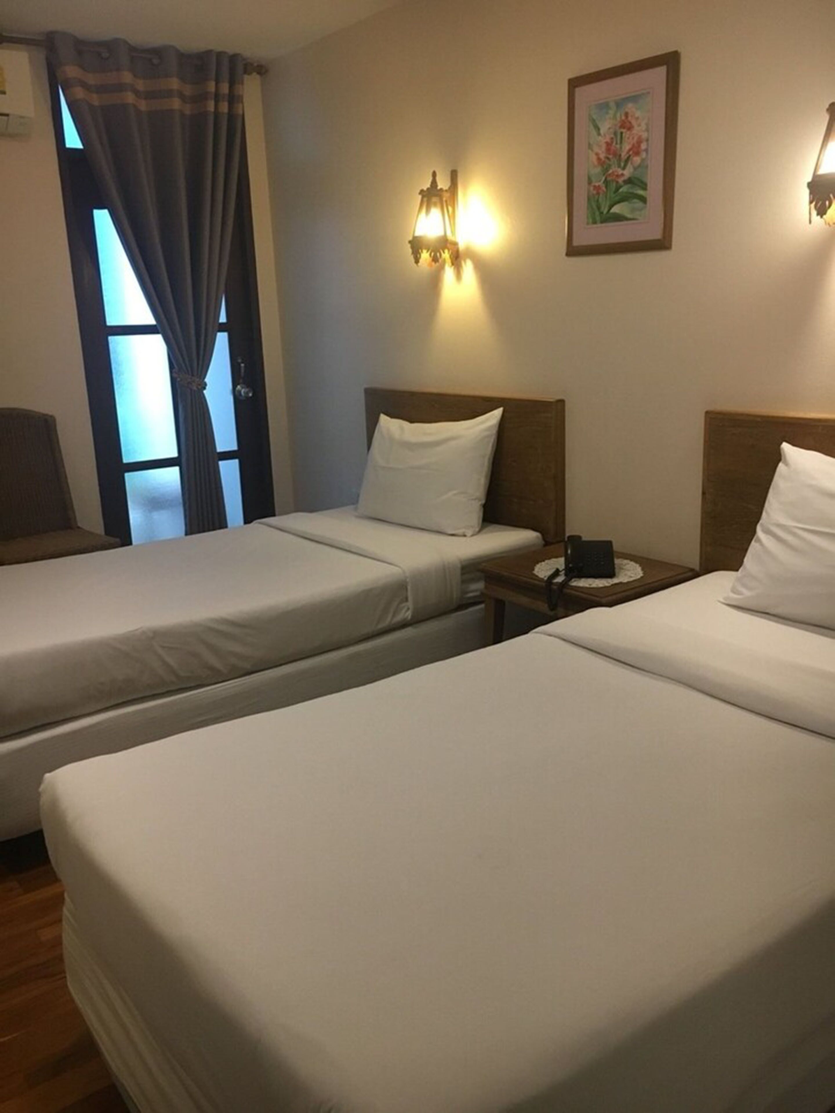 standard twin bed room with balcony | in-room safe, blackout curtains, rollaway beds, free wifi