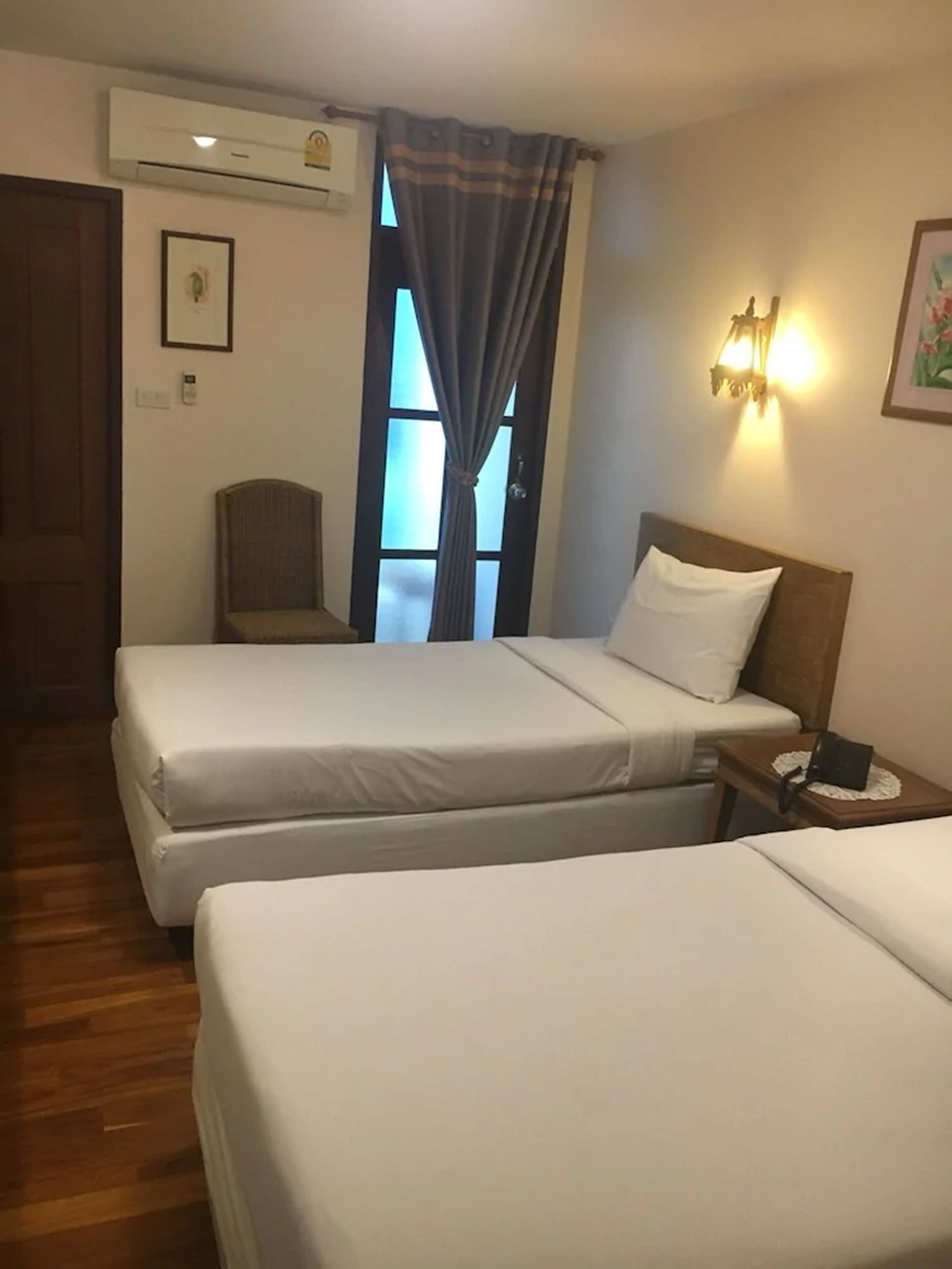 standard twin bed room with balcony | in-room safe, blackout curtains, rollaway beds, free wifi