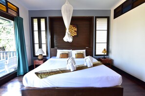 Garden View Bungalow | Minibar, safe på rommet, ekstrasenger (mot et tillegg) og sengetøy