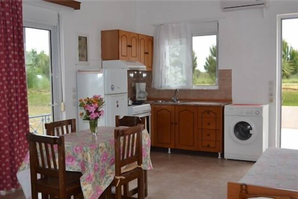Apartment, 1 Bedroom, Balcony, Pool View | Living area | Flat-screen TV