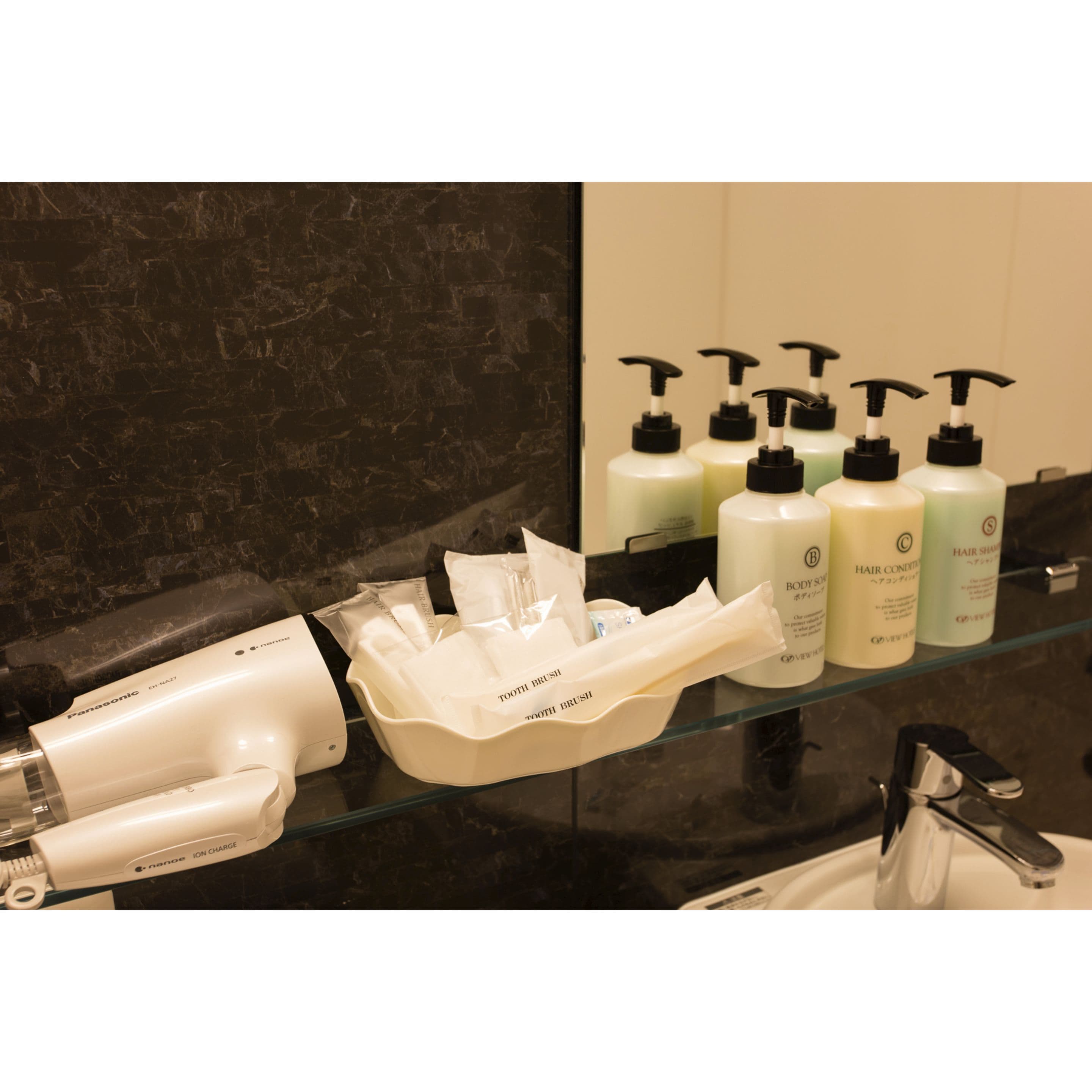 combined shower/bathtub, free toiletries, hair dryer, slippers