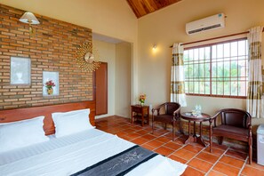 Bungalow, Sea View | Minibar, in-room safe, desk, free cribs/infant beds - Vung Bau Resort (Phu Quoc)