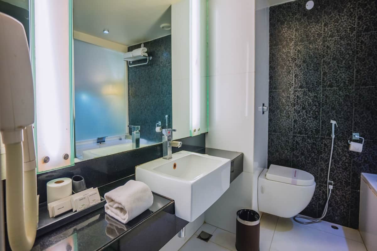 premium double room | bathroom | jetted bath, free toiletries, hair dryer, bathrobes