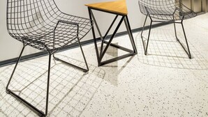 A waiting area with two wireframe chairs, a small wooden table, and a framed artwork on the wall. - Lampa Design Hotel - Special Class (Istanbul)