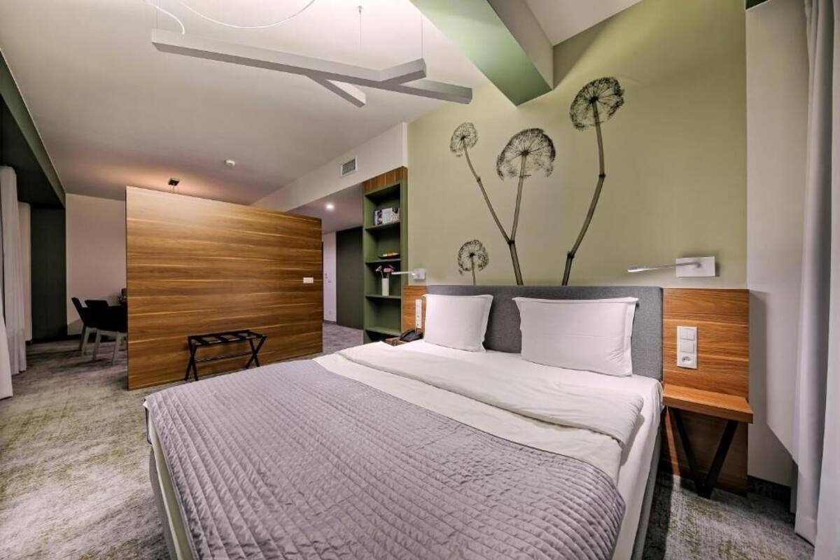 junior apartment | in-room safe, desk, blackout curtains, iron/ironing board