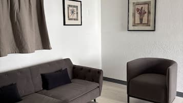 Cottage, 1 Bedroom | Living area | 32-inch flat-screen TV with cable channels, TV