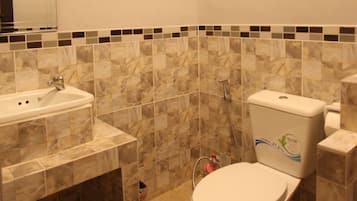 Shower, free toiletries, hair dryer, slippers