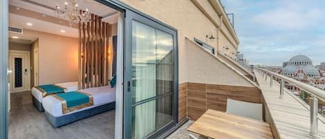 Deluxe Triple Room, Balcony | Egyptian cotton sheets, premium bedding, down comforters, minibar