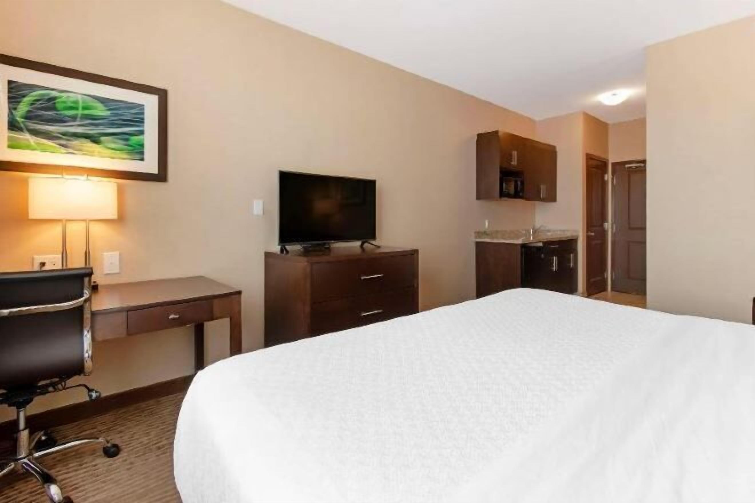 Premium bedding, pillowtop beds, desk, blackout drapes