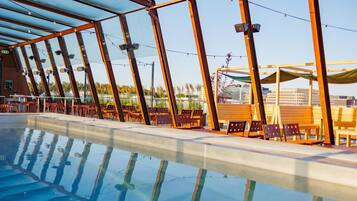 Outdoor pool, open 7:00 AM to 9:00 PM, cabanas (surcharge), sun loungers