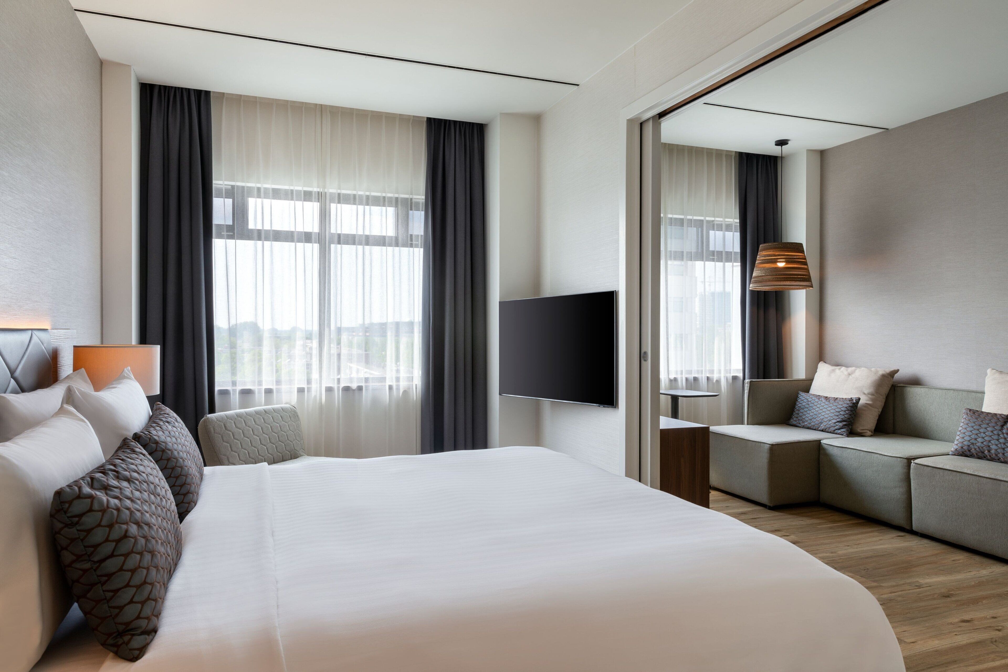 suite, 1 king bed (urban, view) | 1 bedroom, premium bedding, pillow-top beds, in-room safe