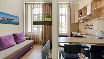 Business Apartment, 1 Bedroom, Kitchen | Living area | 32-inch flat-screen TV with satellite channels, TV