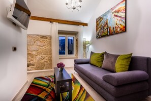 Chambre Double, vue mer | Coin séjour