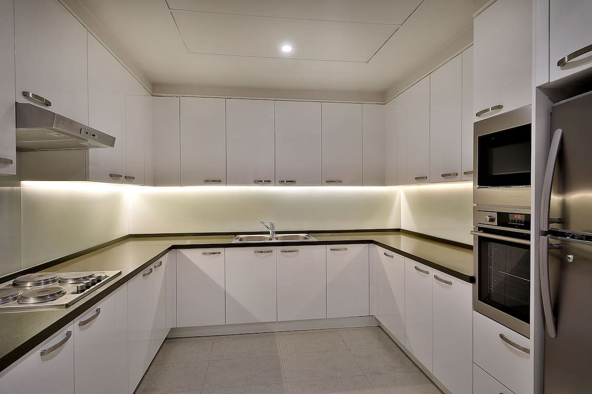 mini-fridge, espresso maker, electric kettle, kitchen islands