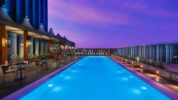 Outdoor pool, open 6:00 AM to 6:00 PM, free pool cabanas, pool loungers
