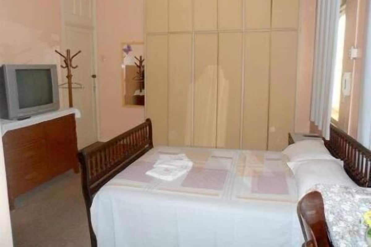 Double or Twin Room | Minibar, desk, blackout drapes, free WiFi
