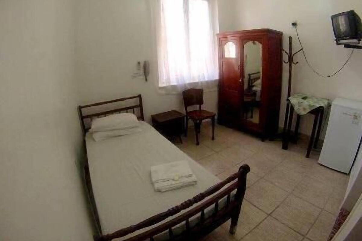 Single Room | Minibar, desk, blackout drapes, free WiFi