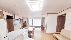 Deluxe Apartment, 3 Bedrooms | Living area - Gillime Pension (Jeju City)