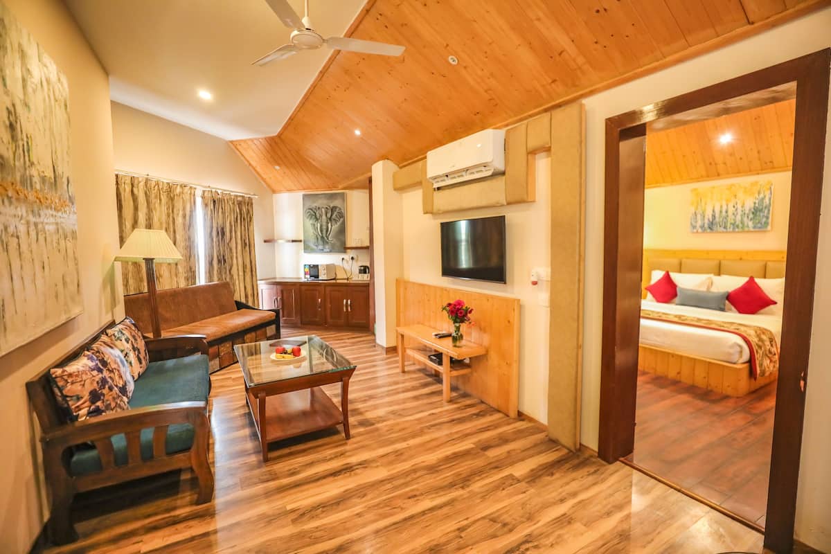 Deluxe-suite - 1 soveværelse | Opholdsområde | Tv