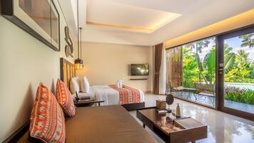 Suite, acceso a la piscina (Free Entrance to Bali Zoo) | Ropa de cama de alta calidad, minibar, caja fuerte y escritorio