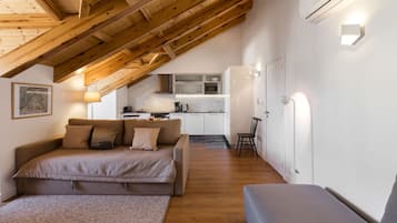 Apartment, 2 Bedrooms | Living area | 43-inch Smart TV with cable channels