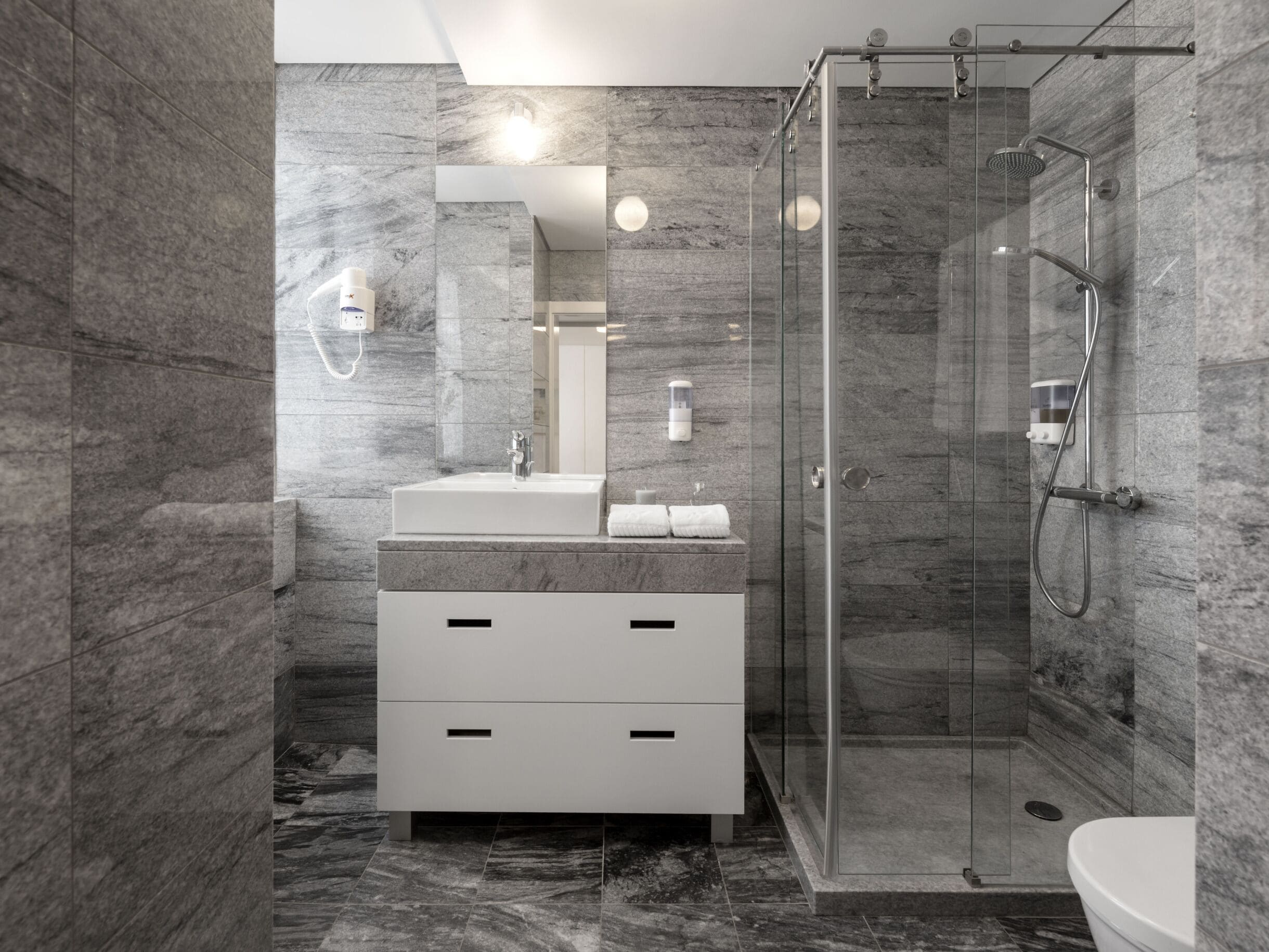 Shower, rainfall showerhead, eco-friendly toiletries, hair dryer