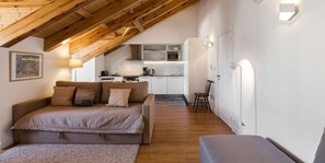 Apartment, 2 Bedrooms, Kitchenette | Living area | 43-inch flat-screen TV with cable channels, TV
