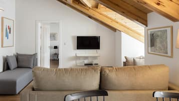 Apartment, 2 Bedrooms | Living area | 43-inch flat-screen TV with cable channels, TV