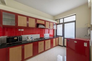 Premium Room, 1 Bedroom | Private kitchen - Treebo Trend Orchard Suites (Bengaluru)