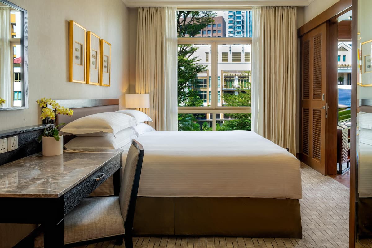 Deluxe Room, 1 Bedroom, Garden View | In-room safe, desk, laptop workspace, iron/ironing board