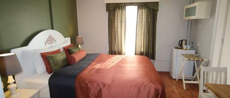 Premium bedding, in-room safe, individually decorated