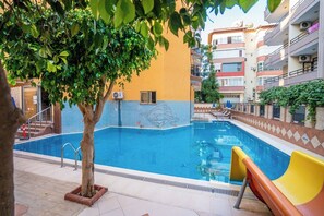 2 outdoor pools, pool umbrellas, pool loungers