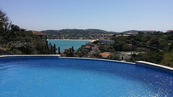 Outdoor pool, pool umbrellas, pool loungers